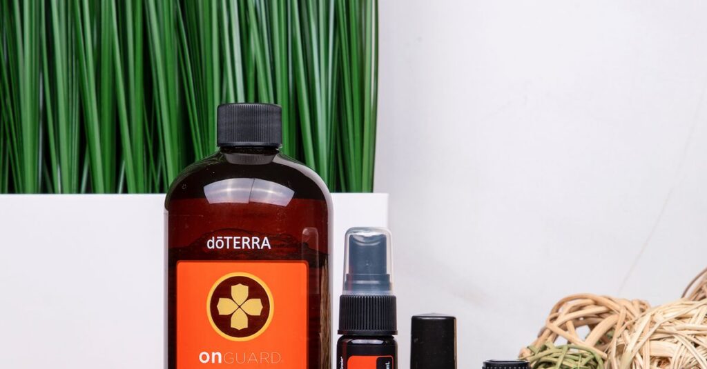 Stylish arrangement of essential oil products with modern home decor elements.